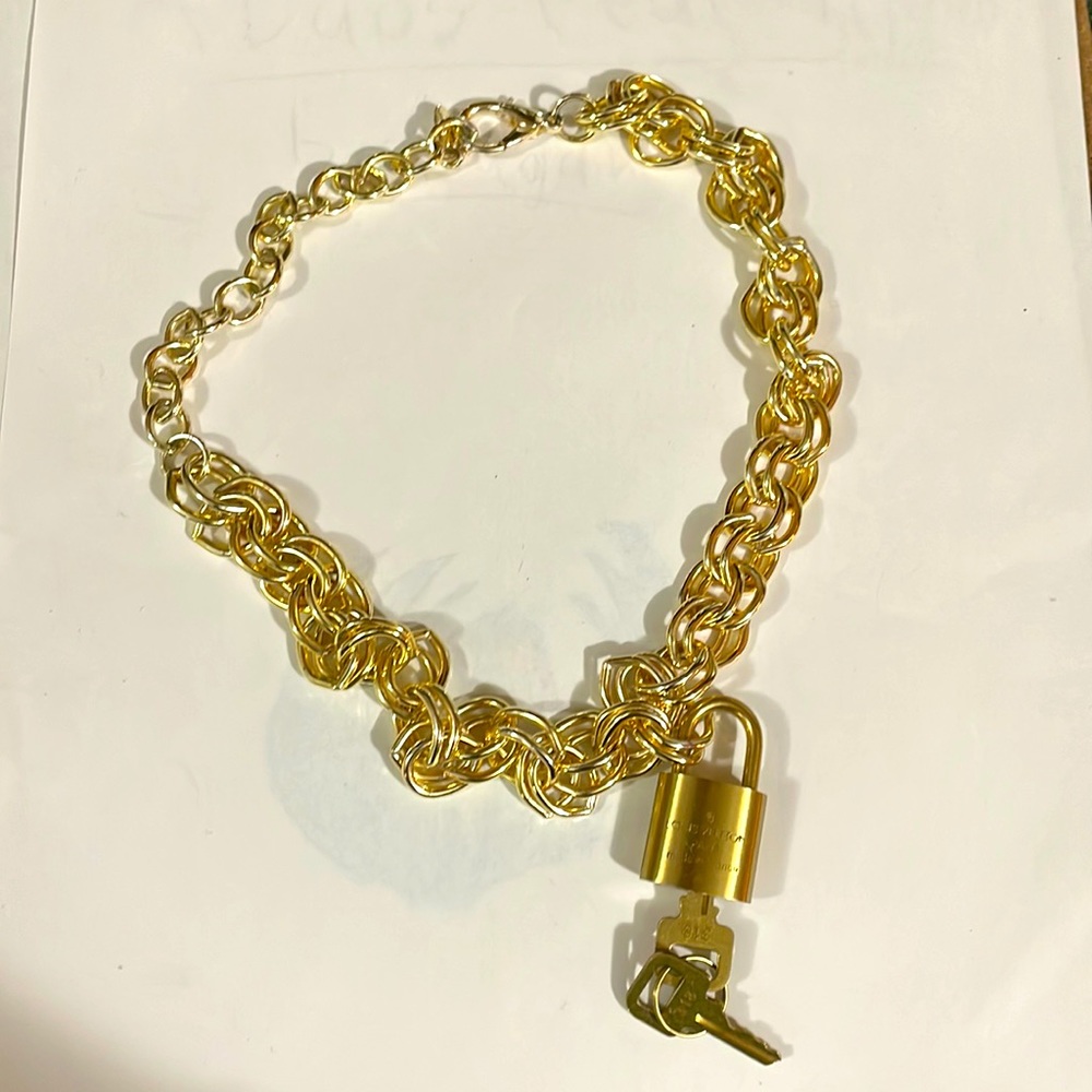 Louis Vuitton Lock # 318 & Necklace